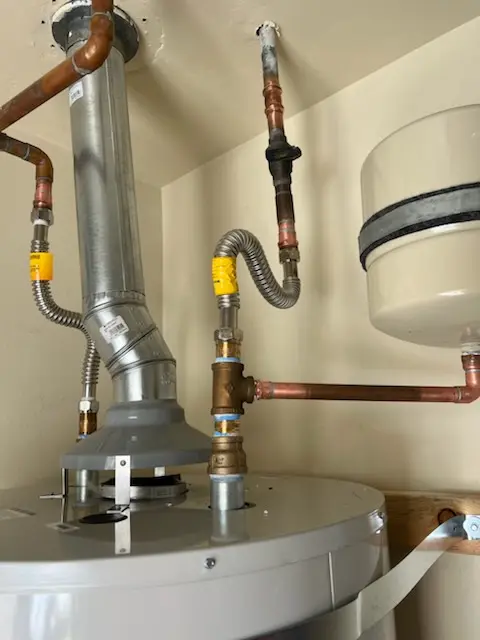 Water heater installation and plumbing repair in Carriage Hill